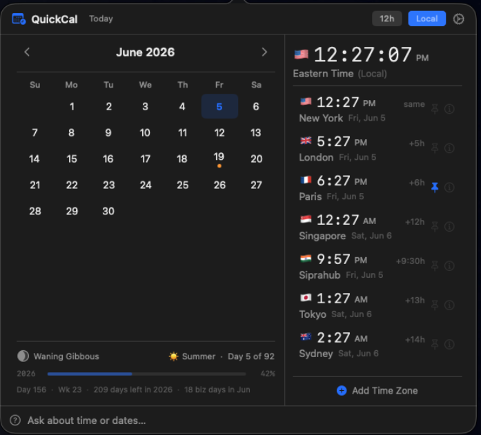QuickCal menu bar app showing calendar and world clock